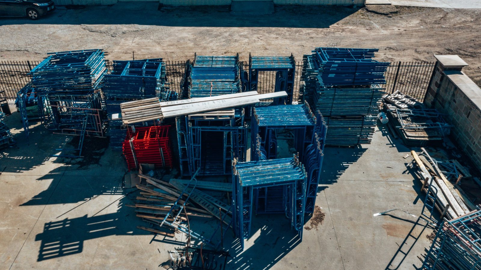 Material yard with scaffolding stacked for delivery